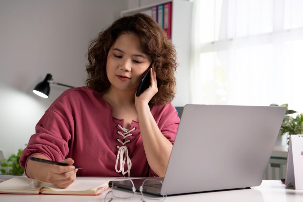 Asian businesswoman making video call
